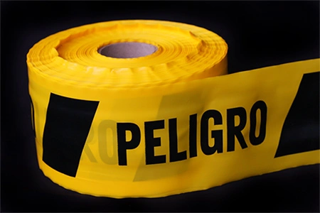 Imagen de previsualización de Cinta de Peligro Amarilla - Enflex, Fábrica de bolsas plásticas